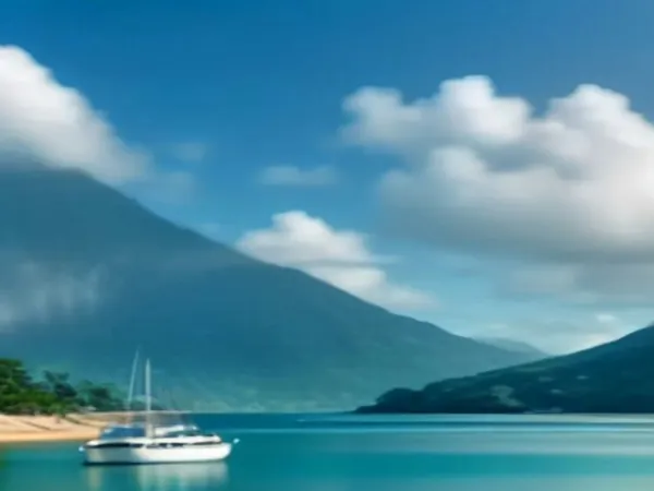 A calm blue harbor with green mountains and a small white boat