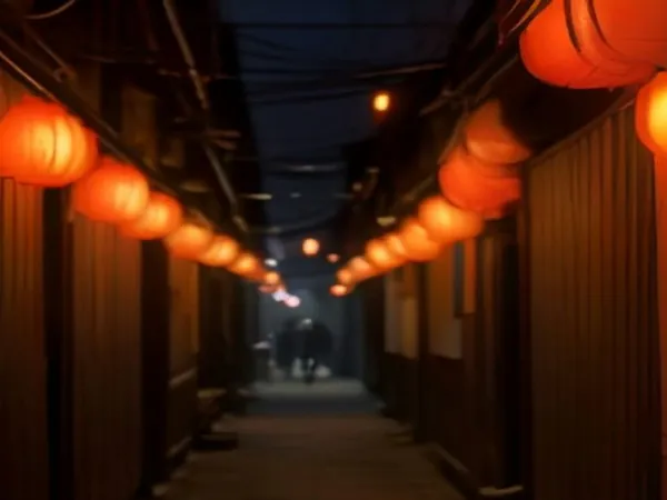 A narrow alley of small bars at night lit by red paper lanterns