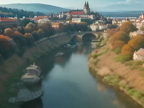 Red rooftops and the painted castle tower of Český Krumlov in a river bend