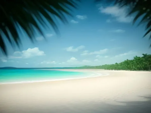 A white sand beach with turquoise water framed by palm fronds